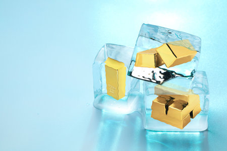 Ice cubes on turquoise background.の写真素材