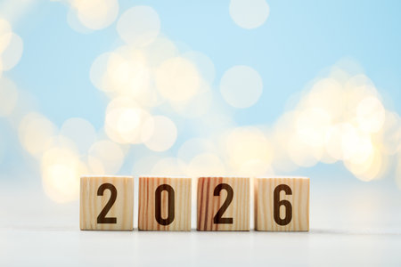 New 2026 year. Cubes with numbers on light background, bokeh effectの写真素材