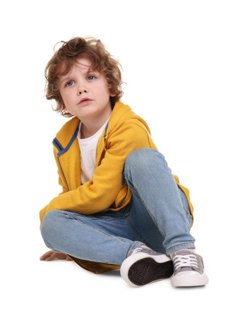 Portrait of cute little boy on white backgroundの写真素材
