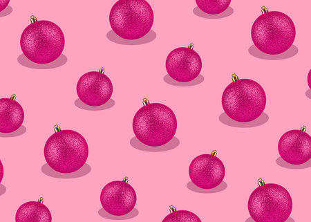 Christmas balls on pink background. Festive repetitive patternの写真素材