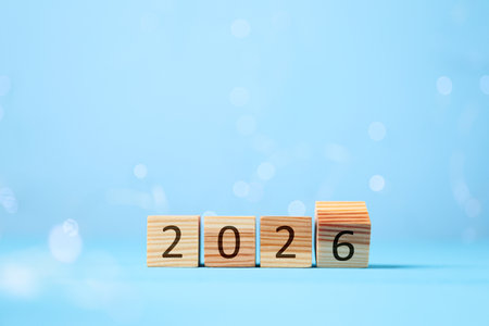 New 2026 year. Cubes with numbers on light blue backgroundの写真素材
