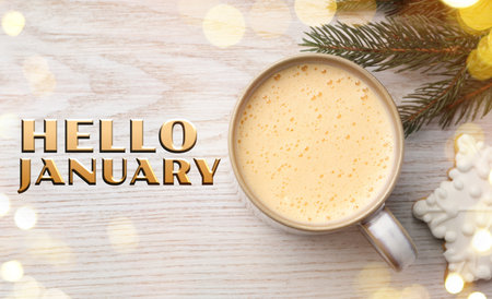 Hello January, winter time card with cup of hot drink and cookies on wooden tableの写真素材