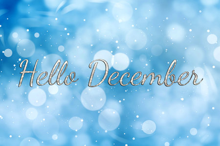 Hello December. Winter time card with snow and bokeh lights on blue backgroundの写真素材