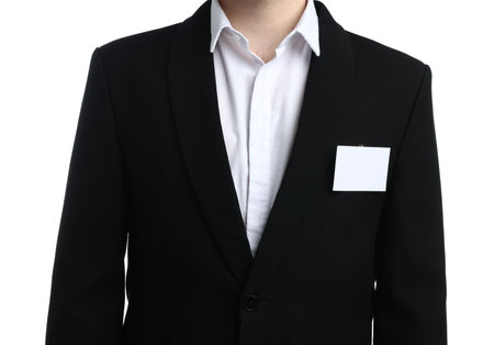 Businessman with blank badge on white background, closeupの写真素材