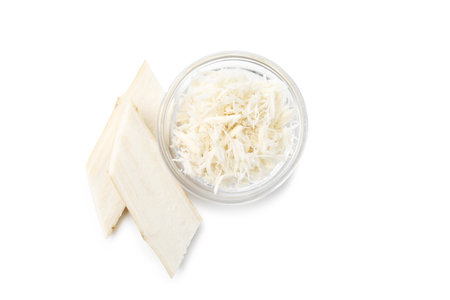 Grated horseradish and cut root isolated on white, top viewの写真素材