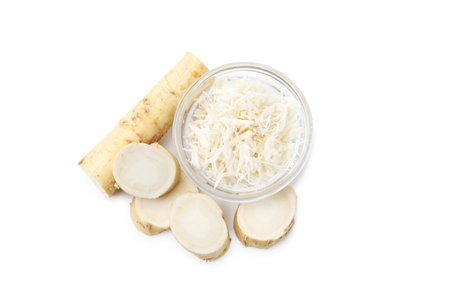 Grated horseradish and cut root isolated on white, top viewの写真素材