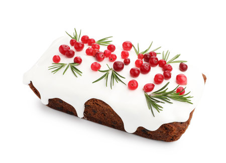 Tasty Christmas cake with cranberries and rosemary isolated on whiteの写真素材