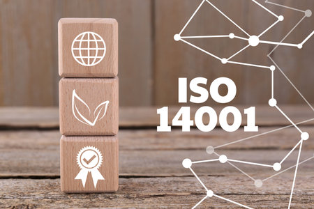 Environmental management systems. Cubes with different icons on wooden tableの写真素材