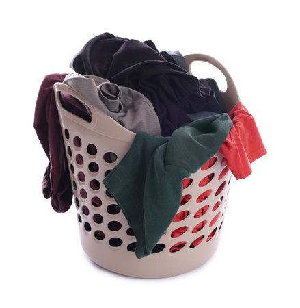 Plastic basket with laundry isolated on whiteの写真素材