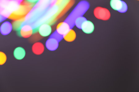 Bright lights on blurred background, bokeh effect. Space for textの写真素材