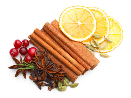Different spices, cranberries, dry orange slices and fresh rosemary for mulled wine isolated on white, top viewの写真素材