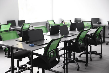 Computer science class with laptops at schoolの写真素材