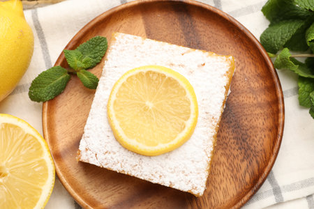 Tasty lemon bar with mint and fresh fruits on table, flat layの写真素材