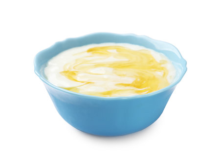 Delicious yogurt with honey isolated on whiteの写真素材