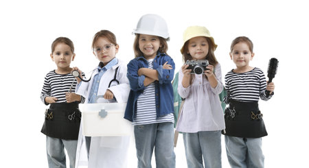Little kid in different clothes on white background, collage. Choice of profession. Same girl representing various occupationsの写真素材