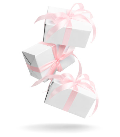 Gift boxes falling on white background. Presentの写真素材