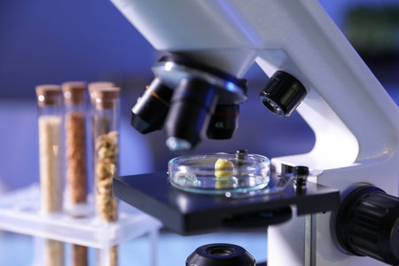 Microscope with product sample in laboratory, closeup