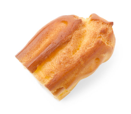 Half of tasty eclair isolated on white, top view