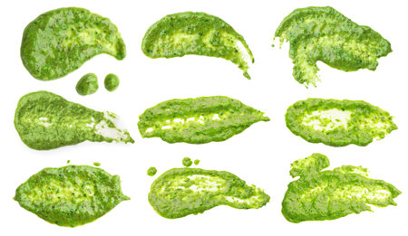 Set of fresh pesto sauce isolated on white, top viewの写真素材