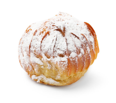 Tasty profiterole with powdered sugar isolated on whiteの写真素材