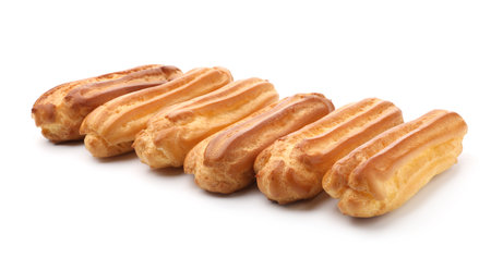 Tasty eclairs isolated on white. Delicious dessert