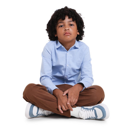 Portrait of little boy on white backgroundの写真素材