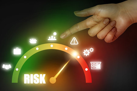 Woman pointing at virtual scale of risk against black background, closeupの写真素材