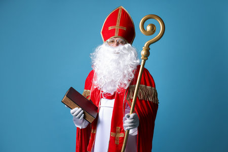 Saint Nicholas with book and crozier on blue backgroundの写真素材
