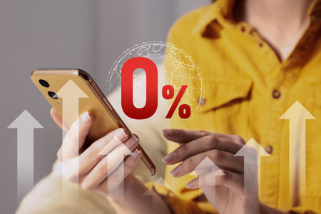 Woman using mobile phone indoors, closeup.の写真素材