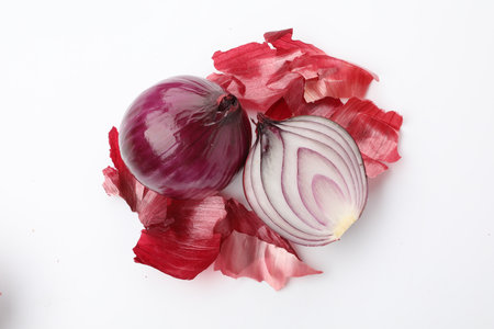 Red onions and peels isolated on white, top viewの写真素材