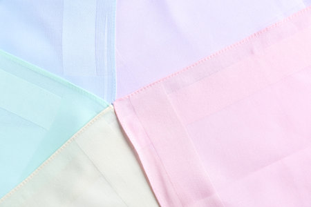 Different pastel color handkerchiefs as background, closeupの写真素材