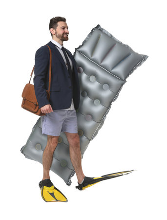 Businessman with air mattress and flippers on white backgroundの写真素材