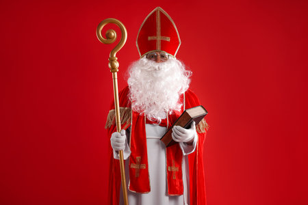 Saint Nicholas with book and crozier on red backgroundの写真素材
