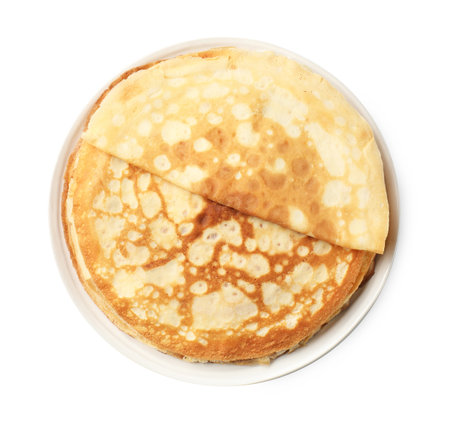 Stack of tasty crepes isolated on white, top viewの写真素材