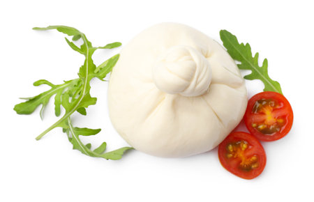 Delicious burrata cheese with tomatoes and arugula isolated on white, top viewの写真素材