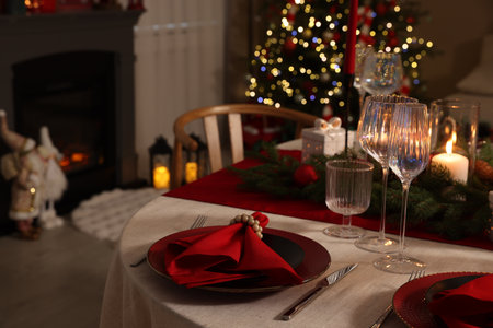 Festive table setting with Christmas decor indoors, closeupの写真素材