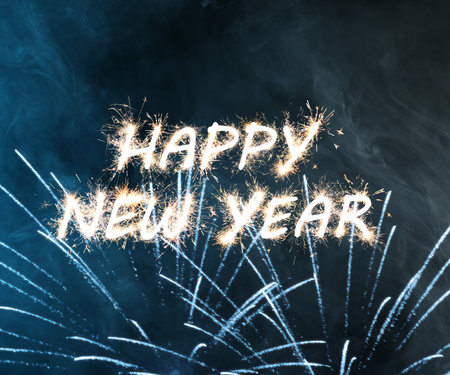 Happy New Year greeting card with fireworksの写真素材