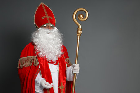 Saint Nicholas with crozier on gray background. Space for textの写真素材