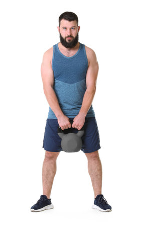 Man exercising with kettlebell on white backgroundの写真素材