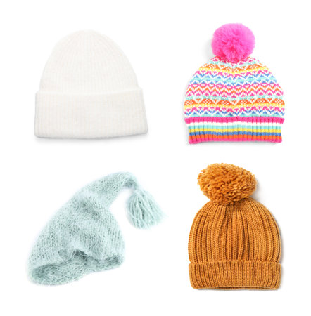 Set of knitted hats isolated on whiteの写真素材