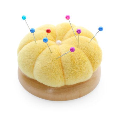 Pincushion with pins isolated on white. Sewing accessoryの写真素材
