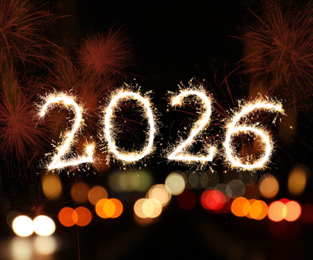 Merry Christmas and Happy New Year card with fireworks and sparkling numbers 2026の写真素材