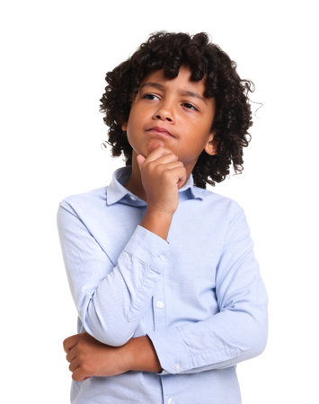 Portrait of thoughtful little boy on white background