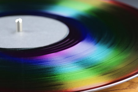 Vinyl record in rainbow colors, closeup view