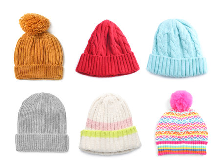 Set of knitted hats isolated on whiteの写真素材