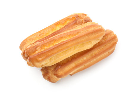 Tasty eclairs isolated on white. Delicious dessert