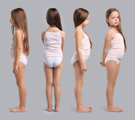 Little girl in underwear on gray background. Set of portraits, view from different sidesの写真素材