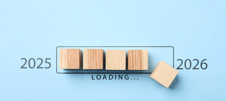 Wooden cubes in loading bar on light blue background, top view. Banner designの写真素材