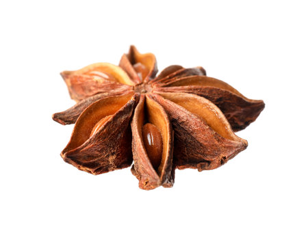 Dry anise star with seeds isolated on whiteの写真素材