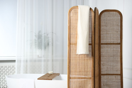 Folding screen in bathroom, closeup. Space for textの写真素材